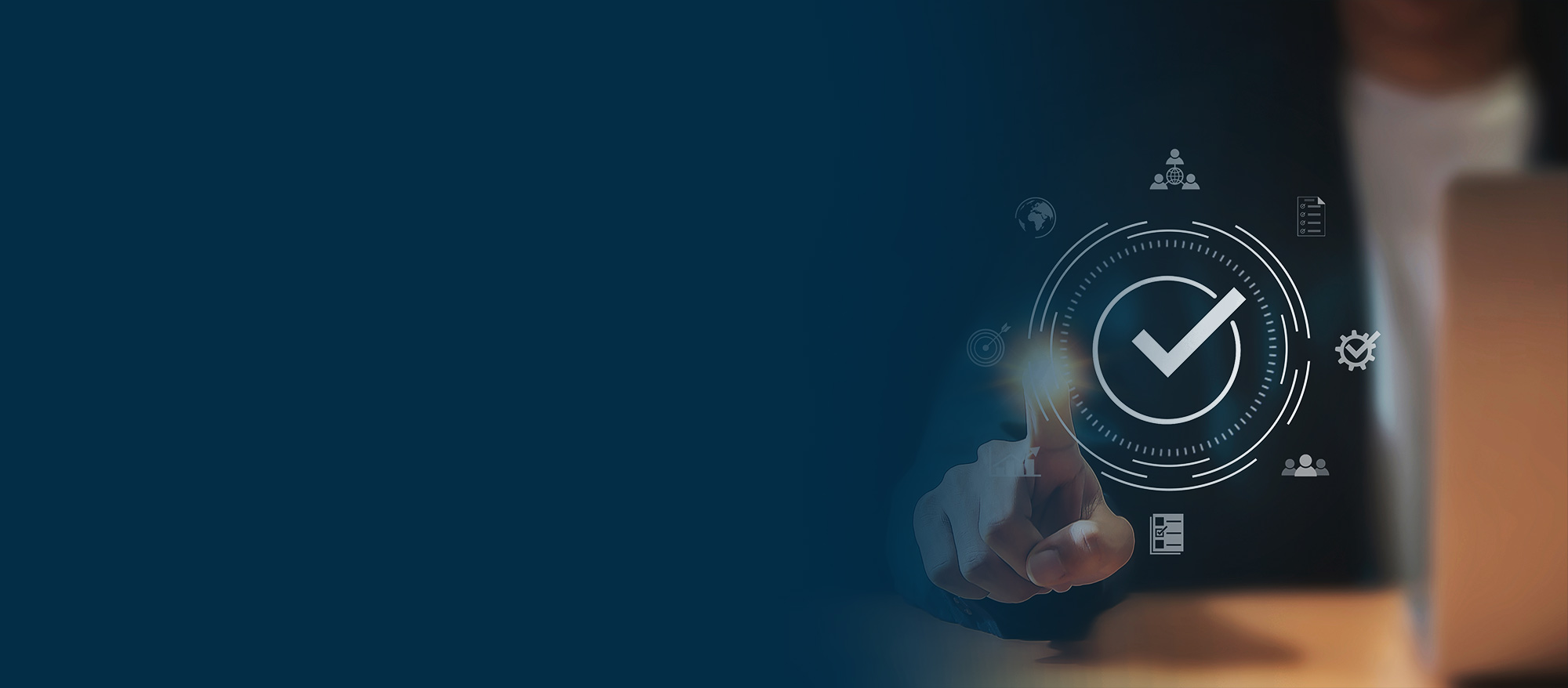 Wealth management professional reviewing tax compliance checklist on computer screen for high net worth client support