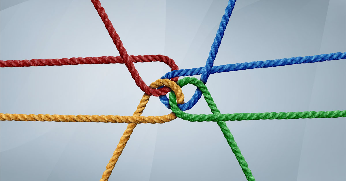 Interconnected ropes tied together, representing the complex forces shaping physician compensation, healthcare workforce strategy, and reimbursement pressures