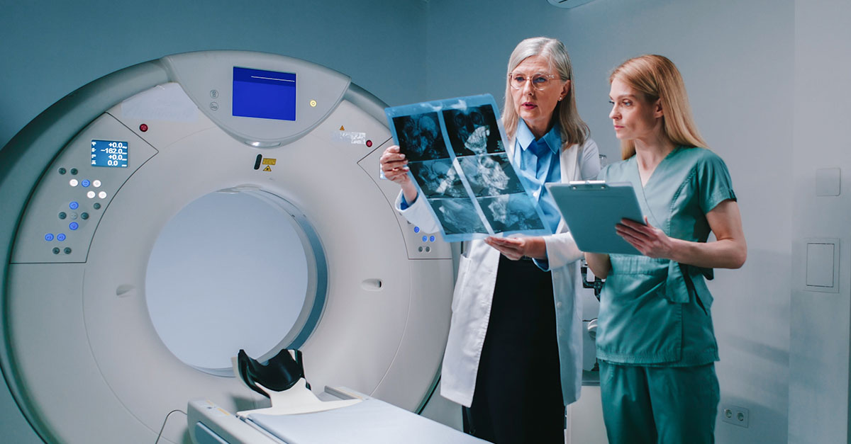 Doctor and nurse reviewing CT scan results, representing provider operations affected by CY 2027 OPPS, Home Health, and ESRD proposed rules.