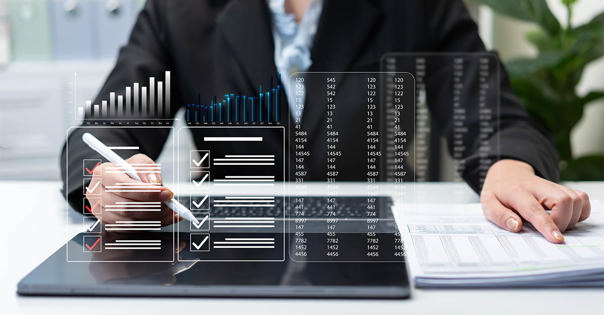 Professional reviewing financial records and data during a forensic accounting investigation